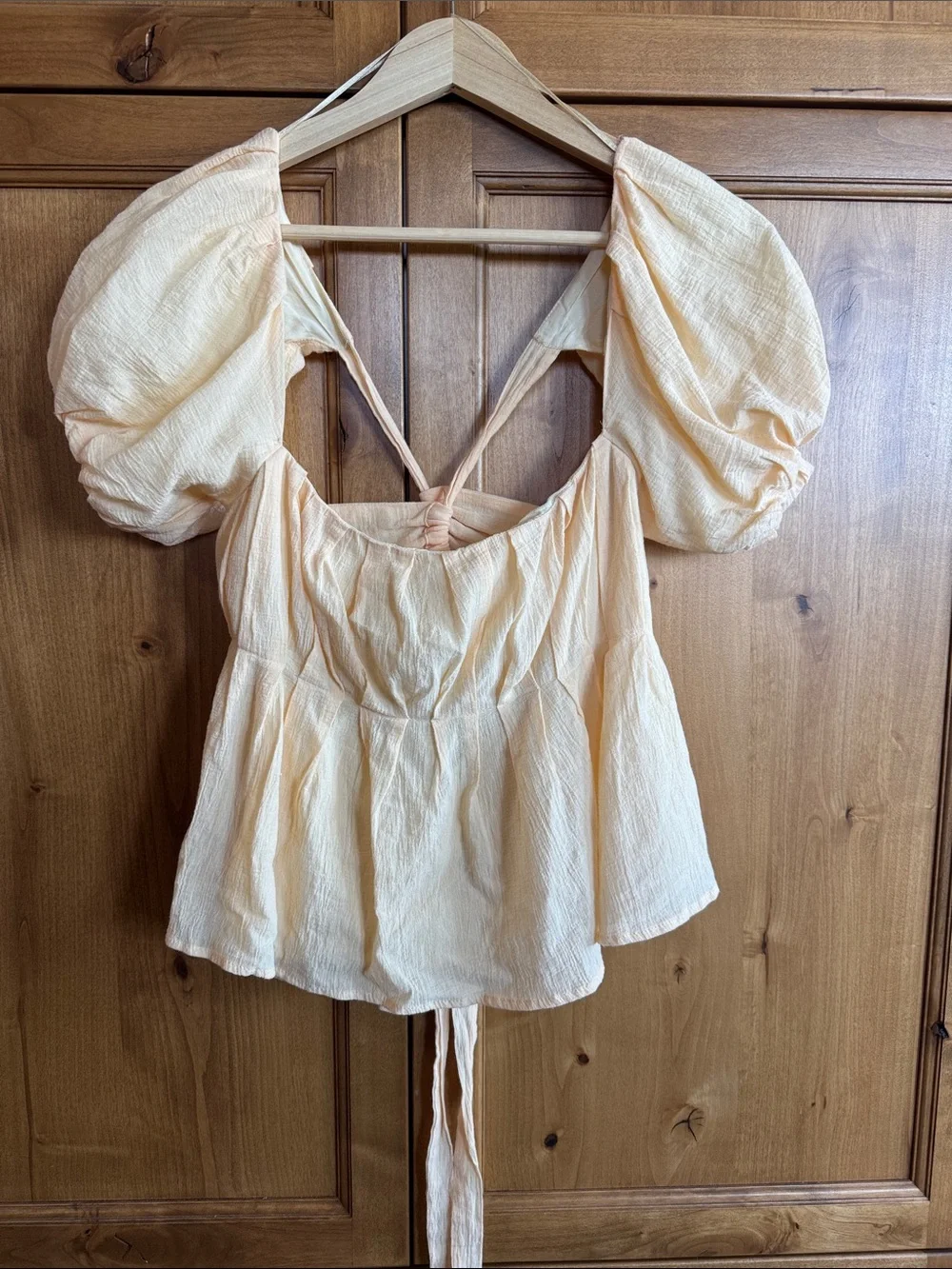 Astr puff-sleeve square-neck peplum top in pale yellow